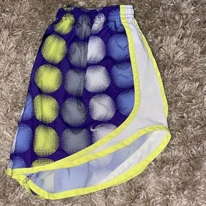 Nike shorts in purple and yellow polka dot